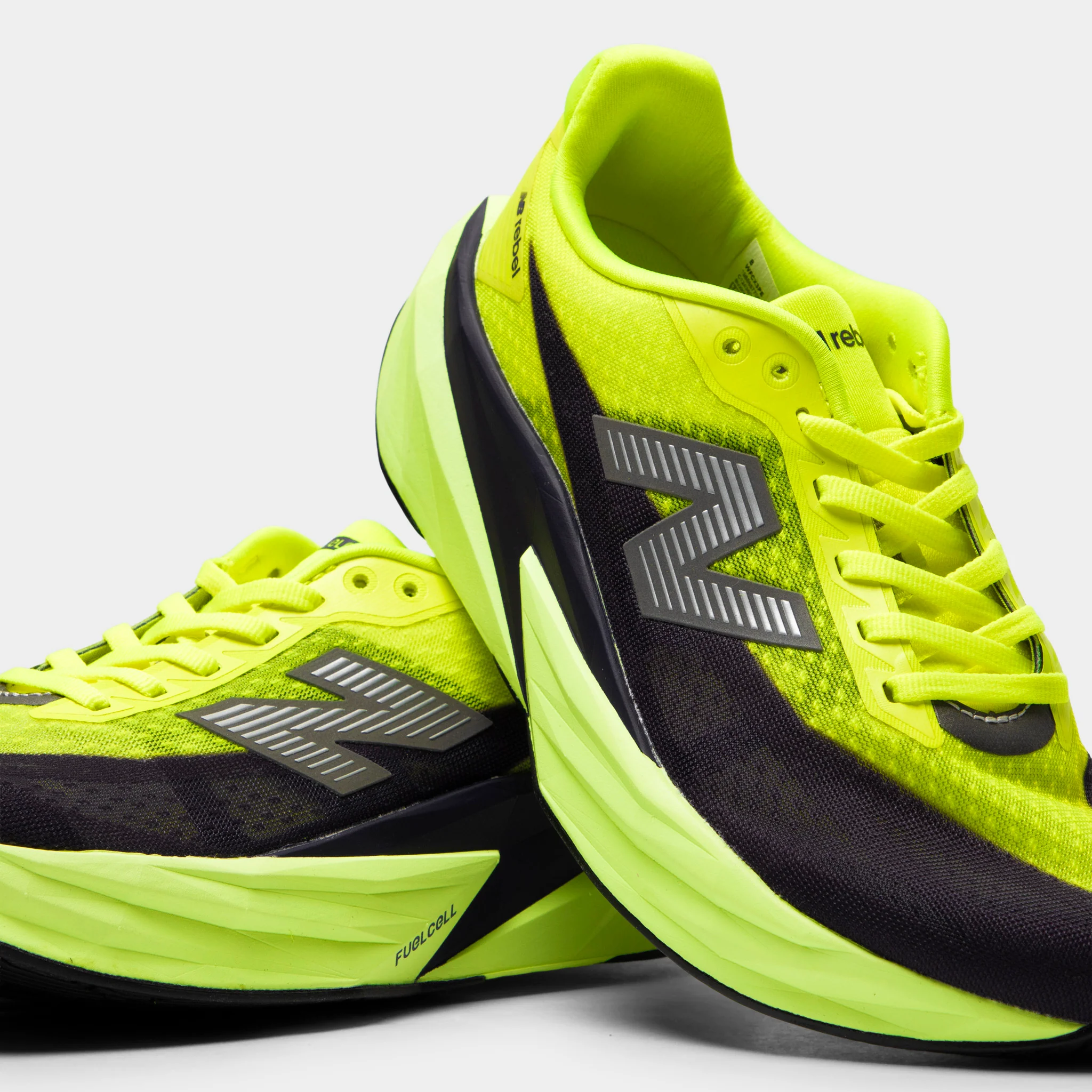 New Balance Women's FuelCell Rebel v5 Alkaline Green / Boysenberry - Image 3